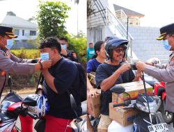 ISPU Tomohon Kategori Tidak Sehat, Kapolres Novrial Kombo Turun Jalan Bagikan 1.000 Masker